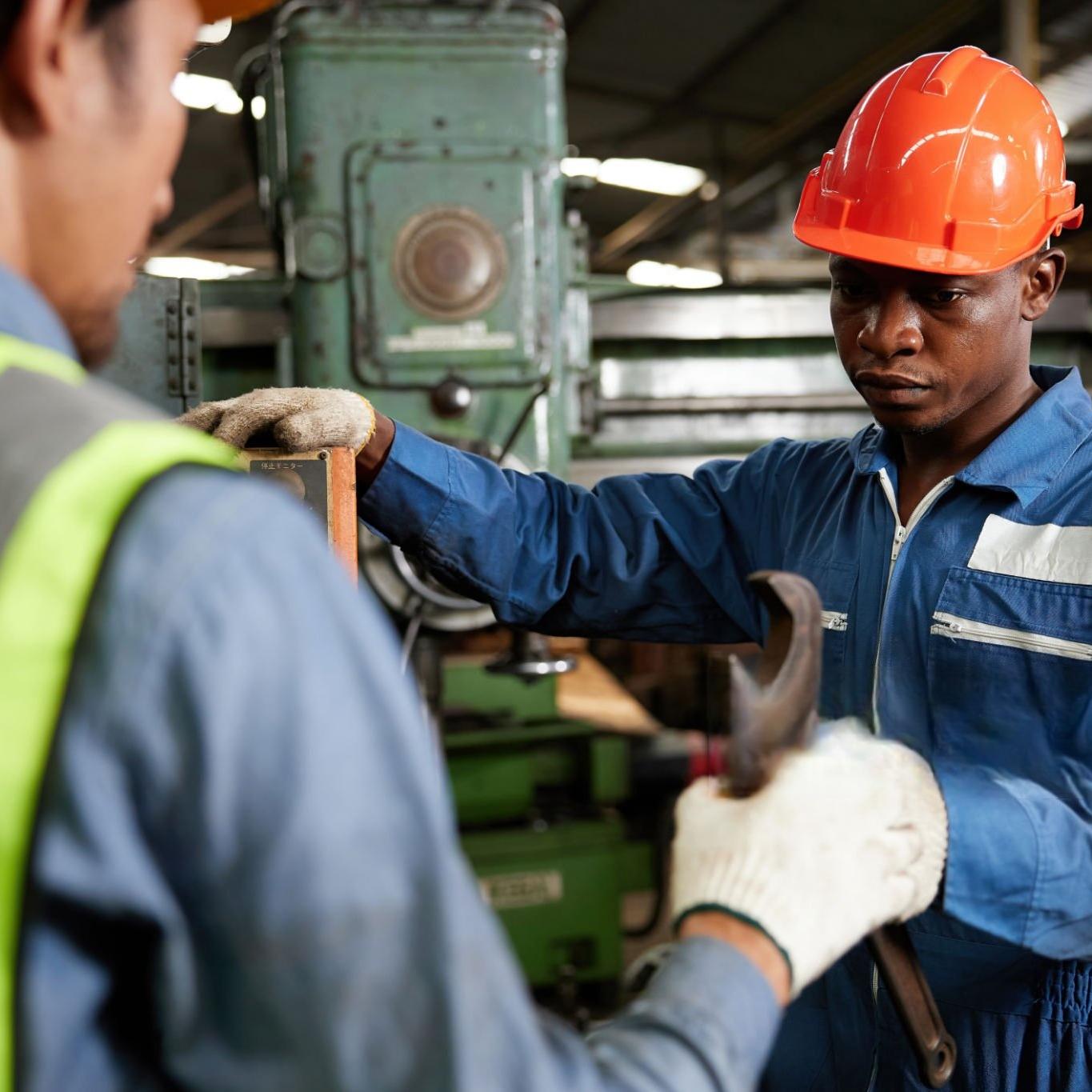 engineer teaching local staff
