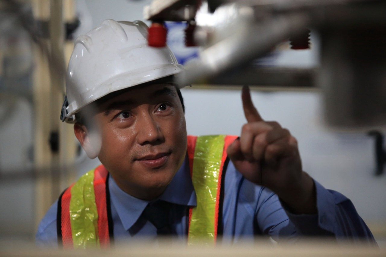 satisfied manager in fertilizer factory