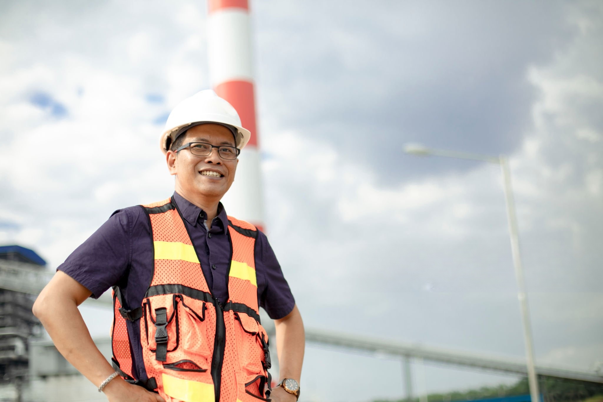 satisfied manager in fertilizer factory